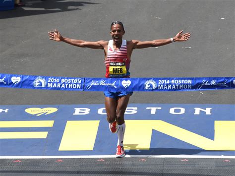 American Meb Keflezighi wins the 2014 Boston Marathon.